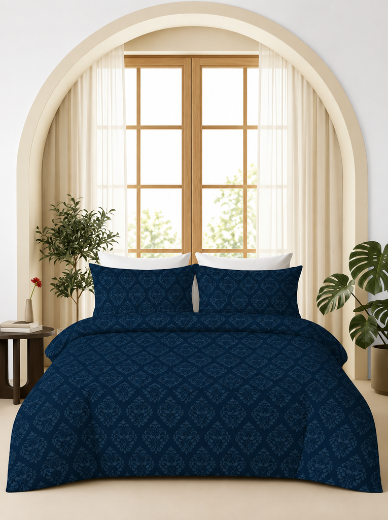 Dark navy blue damask embossed bedsheet set styled on a bed in a modern bedroom