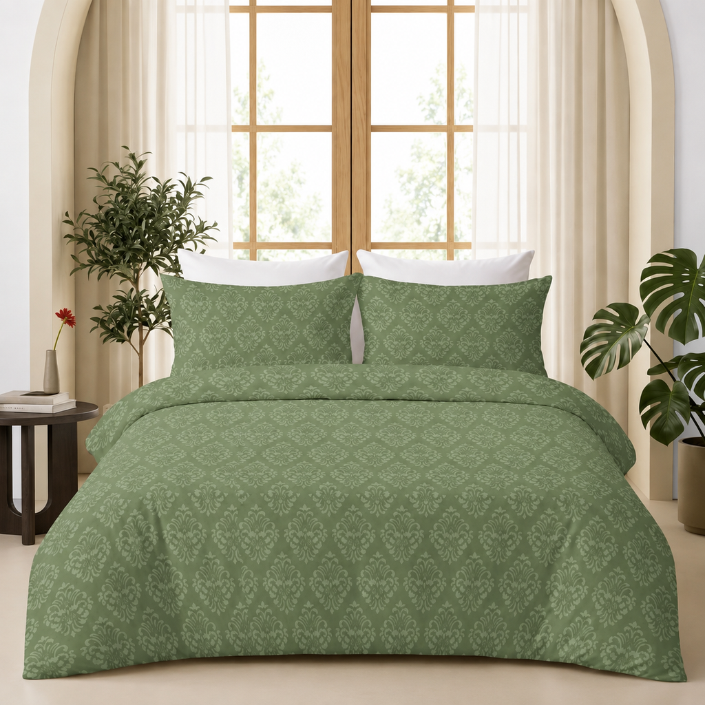 Sage green damask embossed bedsheet set styled on a bed in a modern bedroom.